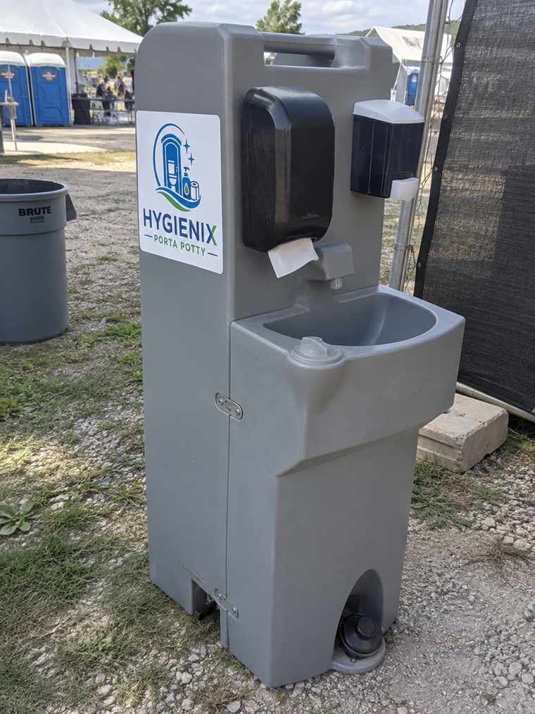 Hygienix Porta Potty handwash station at daytime festival