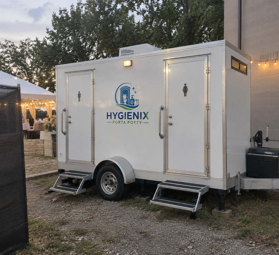 Hygienix Porta Potty restroom trailer at evening event